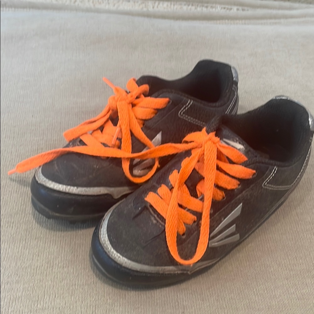 Kids Easton Black and Orange Baseball Cleats